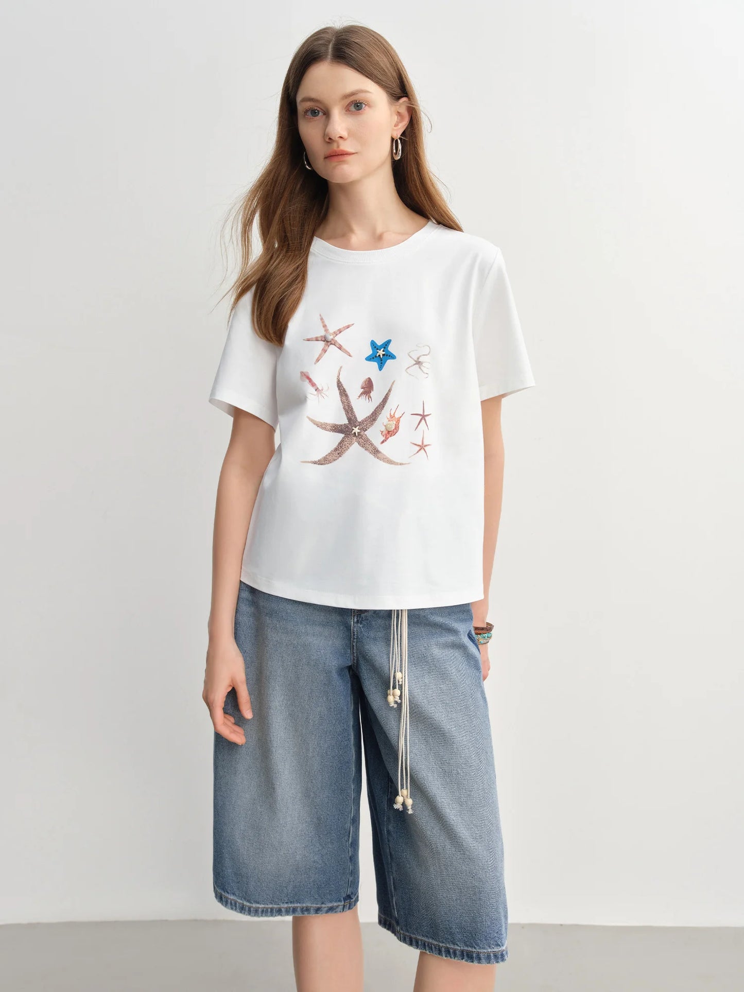 Dushu feminino elemento marinho impresso concha decorada camiseta 2025 nova chegada moda versátil magro casual topo 25ds82912