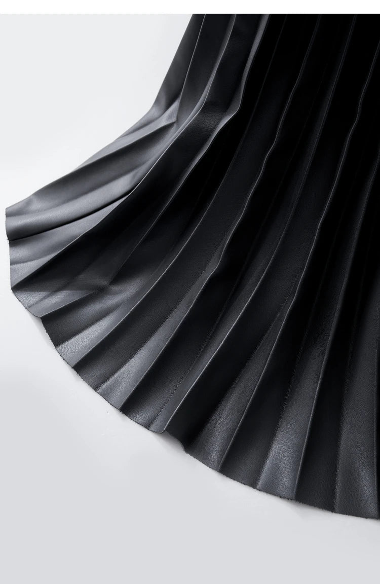 Saia de Couro Feminina Plissada AlmaChic Elegance – Sofisticação e Movimento - AlmaChic