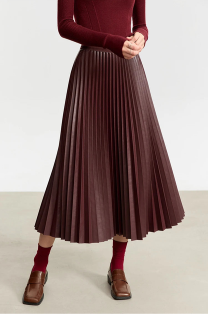 Saia de Couro Feminina Plissada AlmaChic Elegance – Sofisticação e Movimento - AlmaChic
