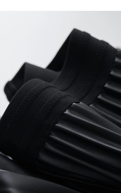 Saia de Couro Feminina Plissada AlmaChic Elegance – Sofisticação e Movimento - AlmaChic